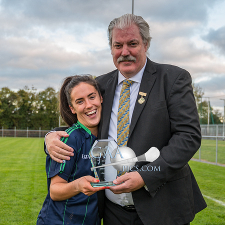 (l-r) Hannah O'Neill of (Foxrock Cabinteely) is presented with