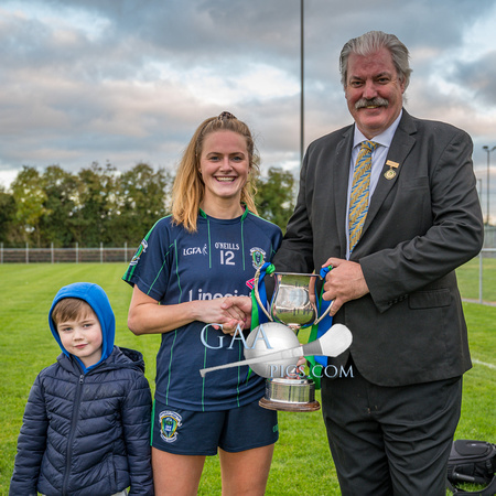 (l-r) Captain Amy Connolly of (Foxrock Cabinteely) is presented